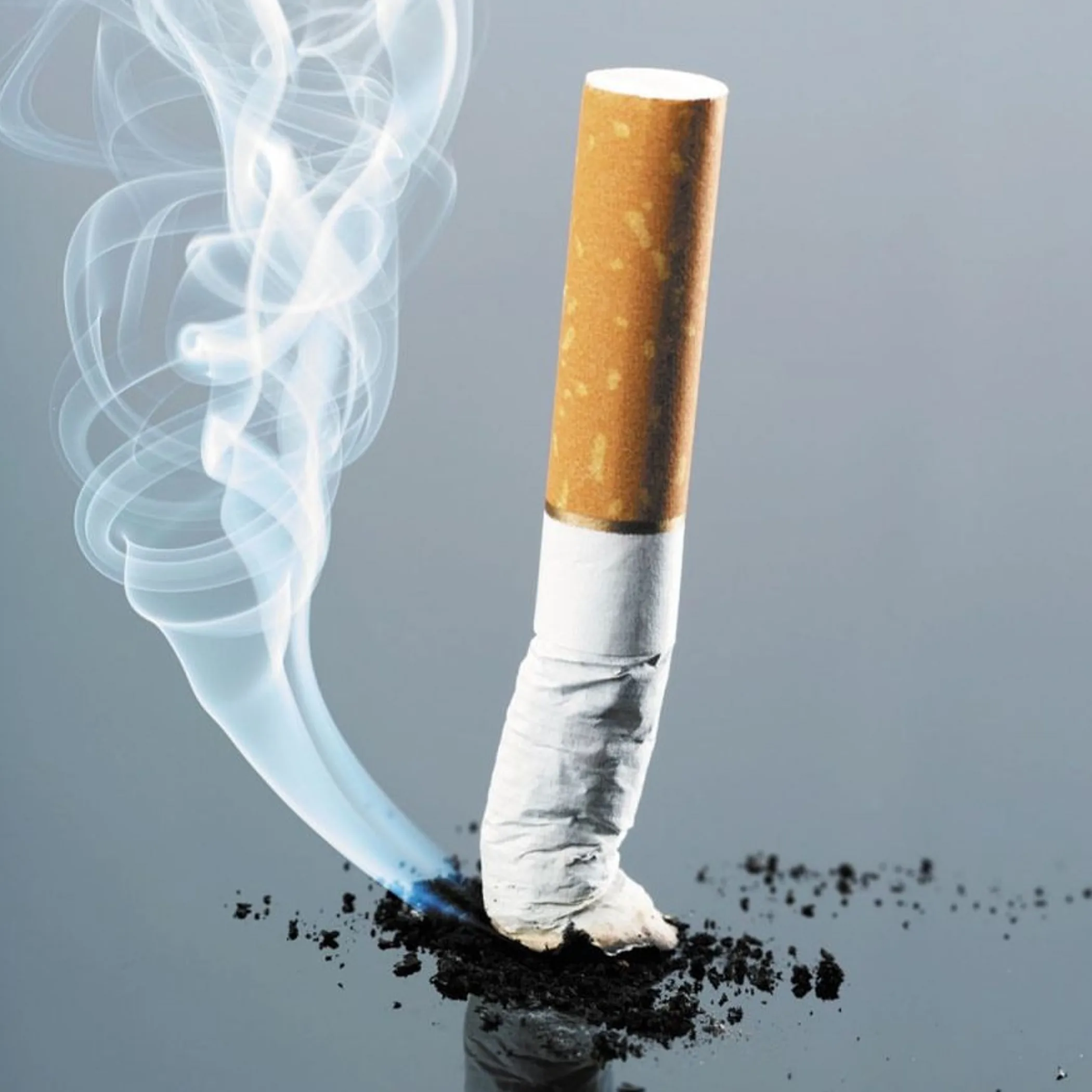 cigarette smoke with surgical instruments background
